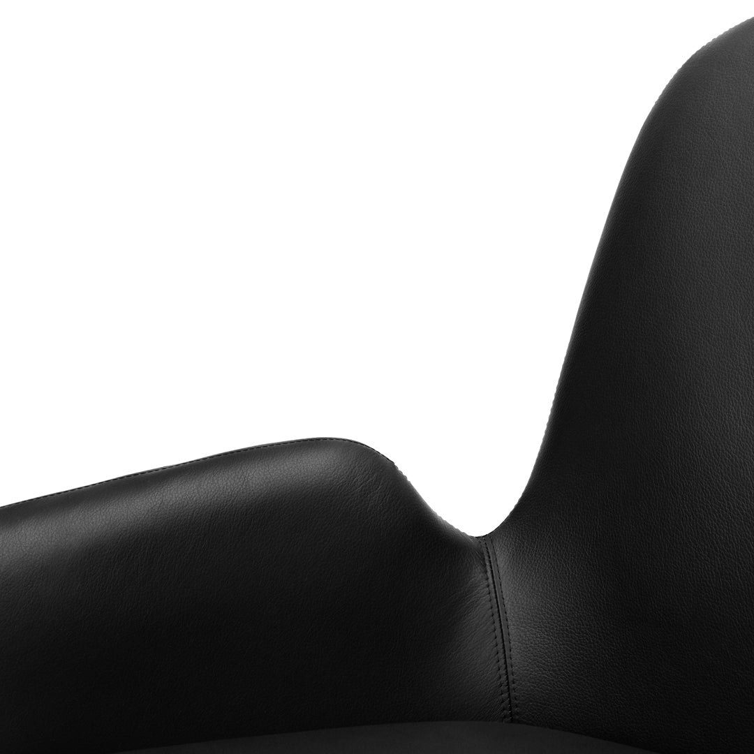 Black leather chair armrest with smooth texture and clean lines against a white background.