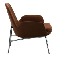 Brown velvet armchair with a sleek chrome frame and minimalist design, perfect for modern interiors.