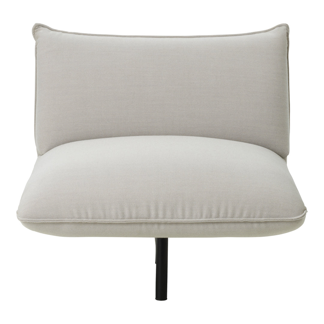 Light grey upholstered chair with a smooth texture and minimalist design, featuring a simple black metal base.