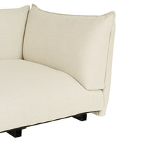 Beige fabric sofa with soft, textured upholstery and clean, modern lines. Elegant and versatile for any decor.