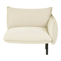 Beige upholstered chair with a textured finish and a minimalist black metal base. Ideal for modern decor.