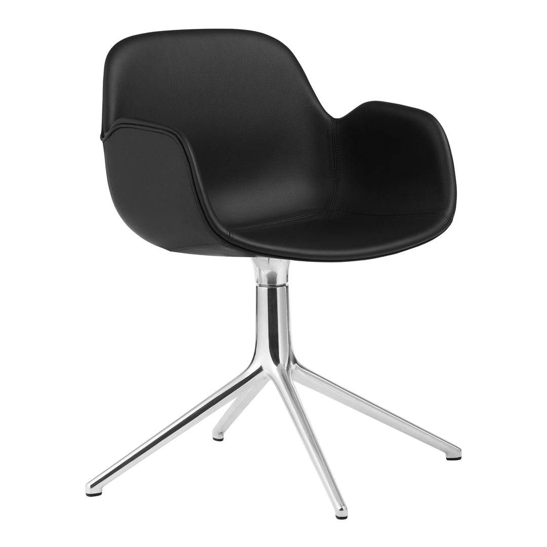 Black molded chair with smooth finish, featuring a sleek chrome base and minimalist design. Perfect for modern decor.