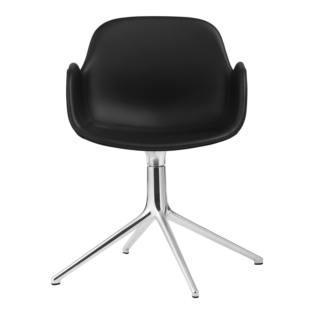 Black ergonomic chair with smooth surface and silver star base, suitable for modern decor.