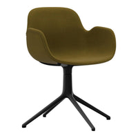 Olive green upholstered chair with a smooth, modern design and a sleek black base. Perfect for contemporary interiors.