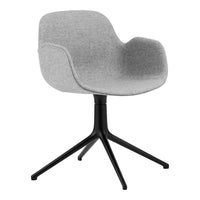 Stylish gray upholstered chair with smooth texture and sleek black base, perfect for modern interiors.