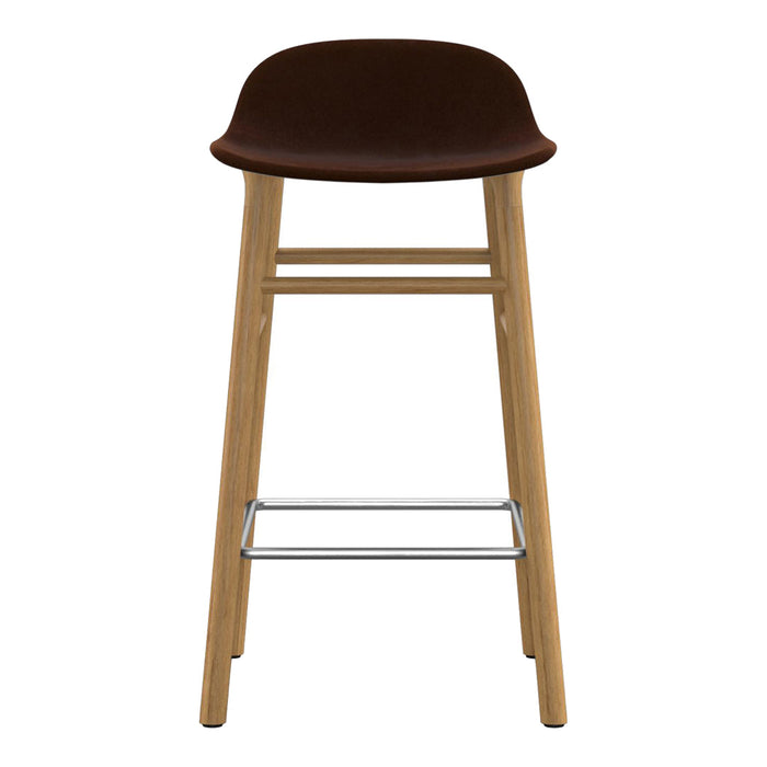 Modern brown upholstered bar stool with natural wood legs and sleek chrome footrest. Simple and stylish design.