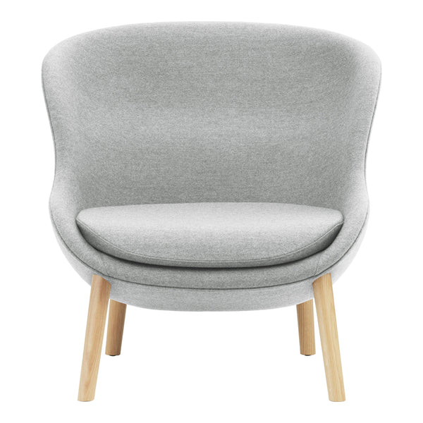 Light gray upholstered chair with a smooth, minimalist design and natural wood legs. Modern and elegant home decor.
