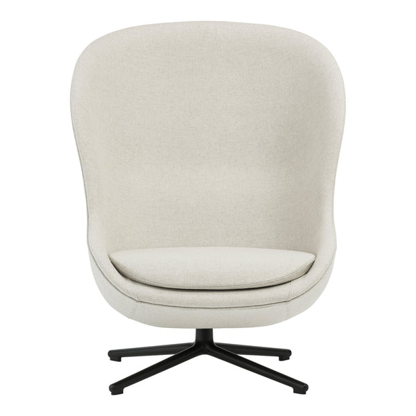 Cozy beige lounge chair with a smooth, rounded design and a minimalist black swivel base. Perfect for modern decor.