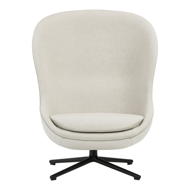 Cozy beige lounge chair with a smooth, rounded design and a minimalist black swivel base. Perfect for modern decor.
