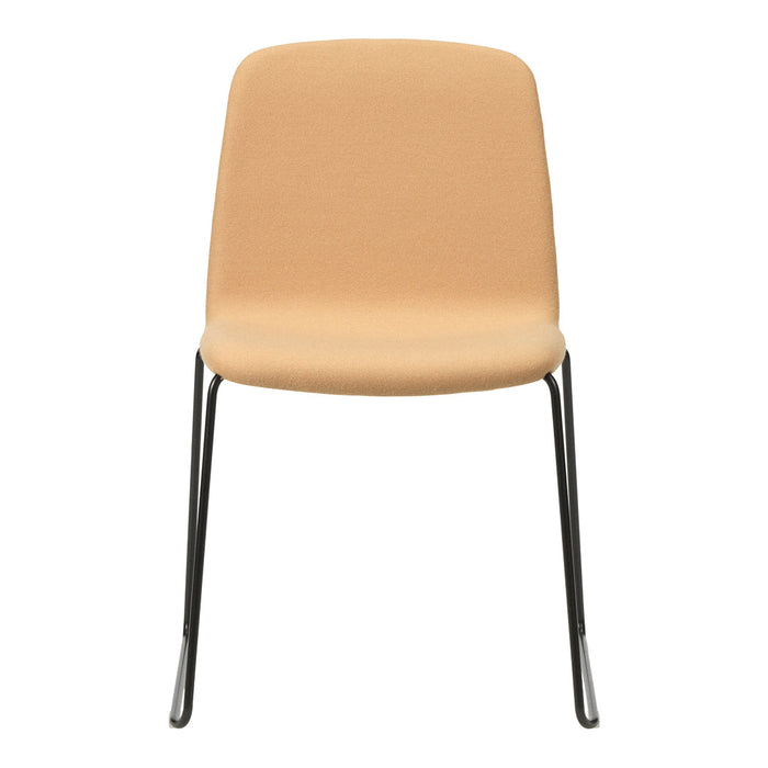 Beige upholstered chair with sleek black metal legs, featuring a minimalist design and smooth surface.