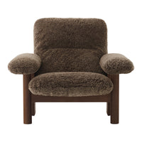 Brown textured upholstery armchair with a cozy, fluffy pattern and wooden frame. Perfect for modern living spaces.