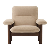 Beige upholstery with a smooth texture and dark wood frame, featuring a minimalist modern design.