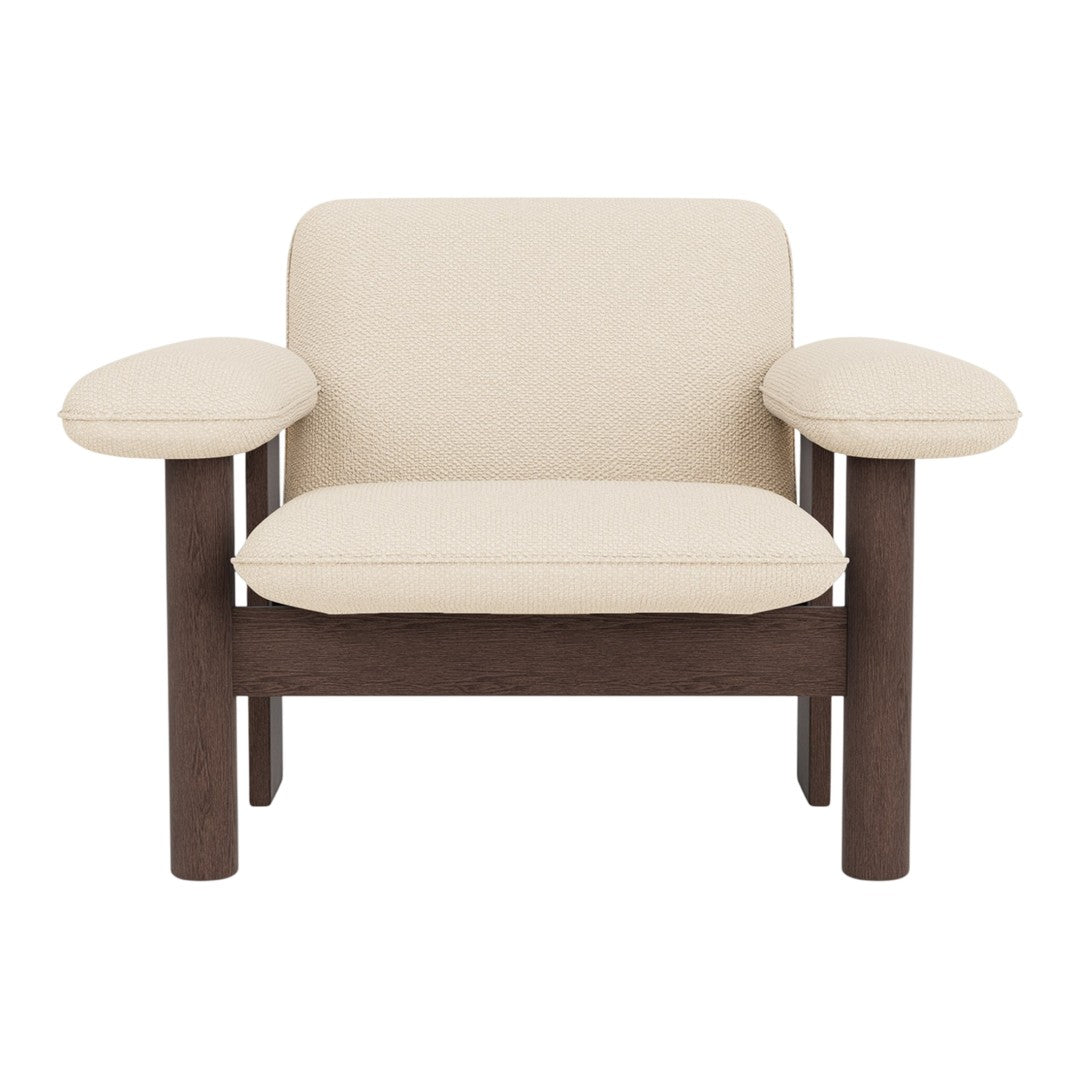 Cream-colored upholstered chair with dark wood accents and a minimalist design. Perfect for modern decor.