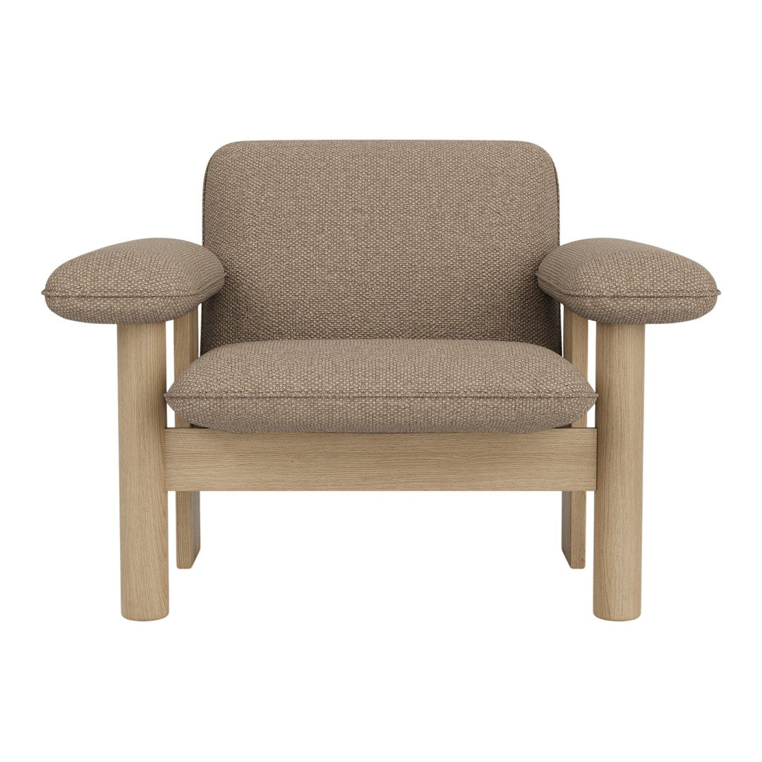 Brown textured upholstery with rounded armrests and natural wood legs, offering a modern and cozy aesthetic.