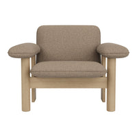 Brown textured upholstery with rounded armrests and natural wood legs, offering a modern and cozy aesthetic.