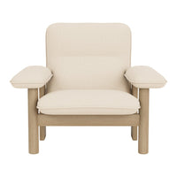 Beige upholstered armchair with a minimalist design and natural wooden legs, featuring a smooth, solid color pattern.