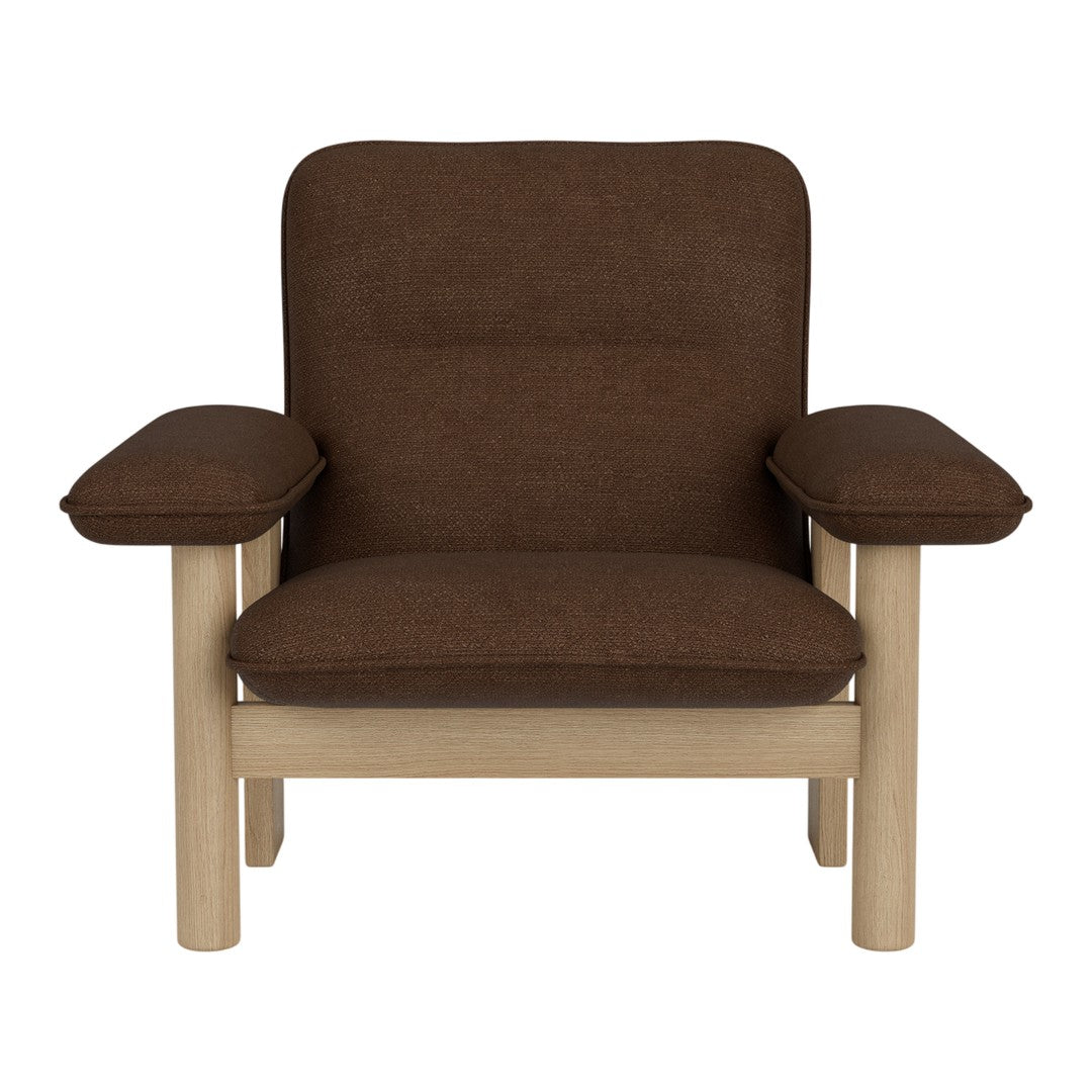 Brown upholstered chair with minimalist design and light wooden arms, perfect for modern interiors.