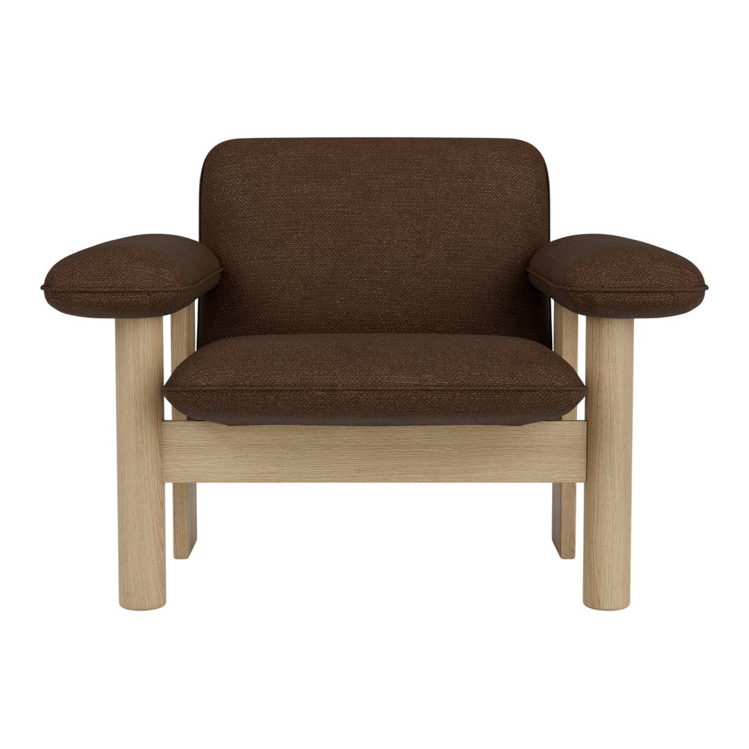 Brown upholstered armchair with light wood frame and simple, geometric design. Ideal for modern interiors.