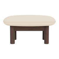 Beige cushioned ottoman with a sleek dark wood frame, featuring a simple, modern design.