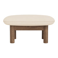 Beige oval ottoman with a soft fabric cushion and natural wood legs, ideal for modern living spaces.