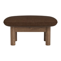 Brown upholstered ottoman with a rounded shape and wooden legs, perfect for modern decor.
