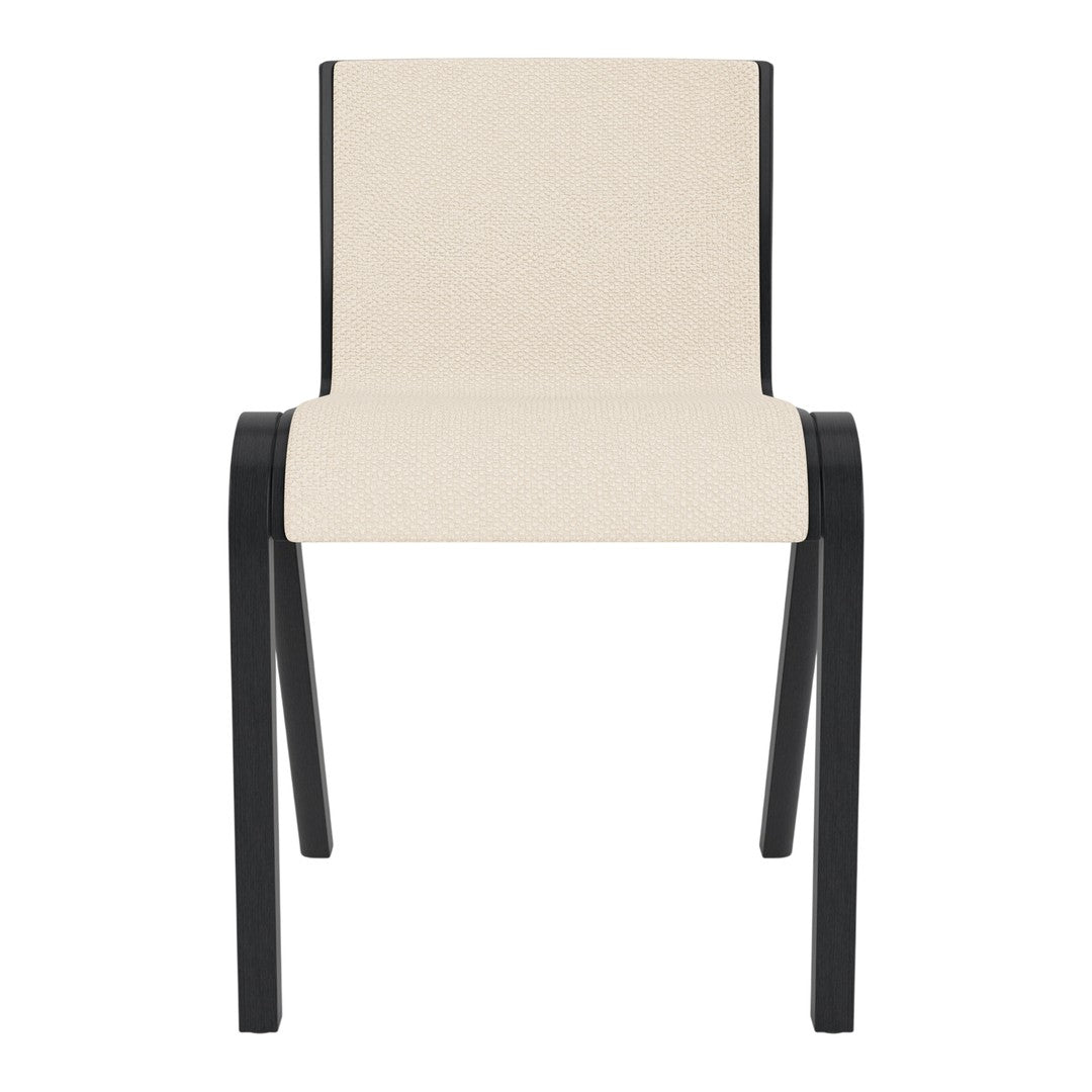 Beige and black modern chair, featuring a minimalistic design with a solid color palette and clean lines.