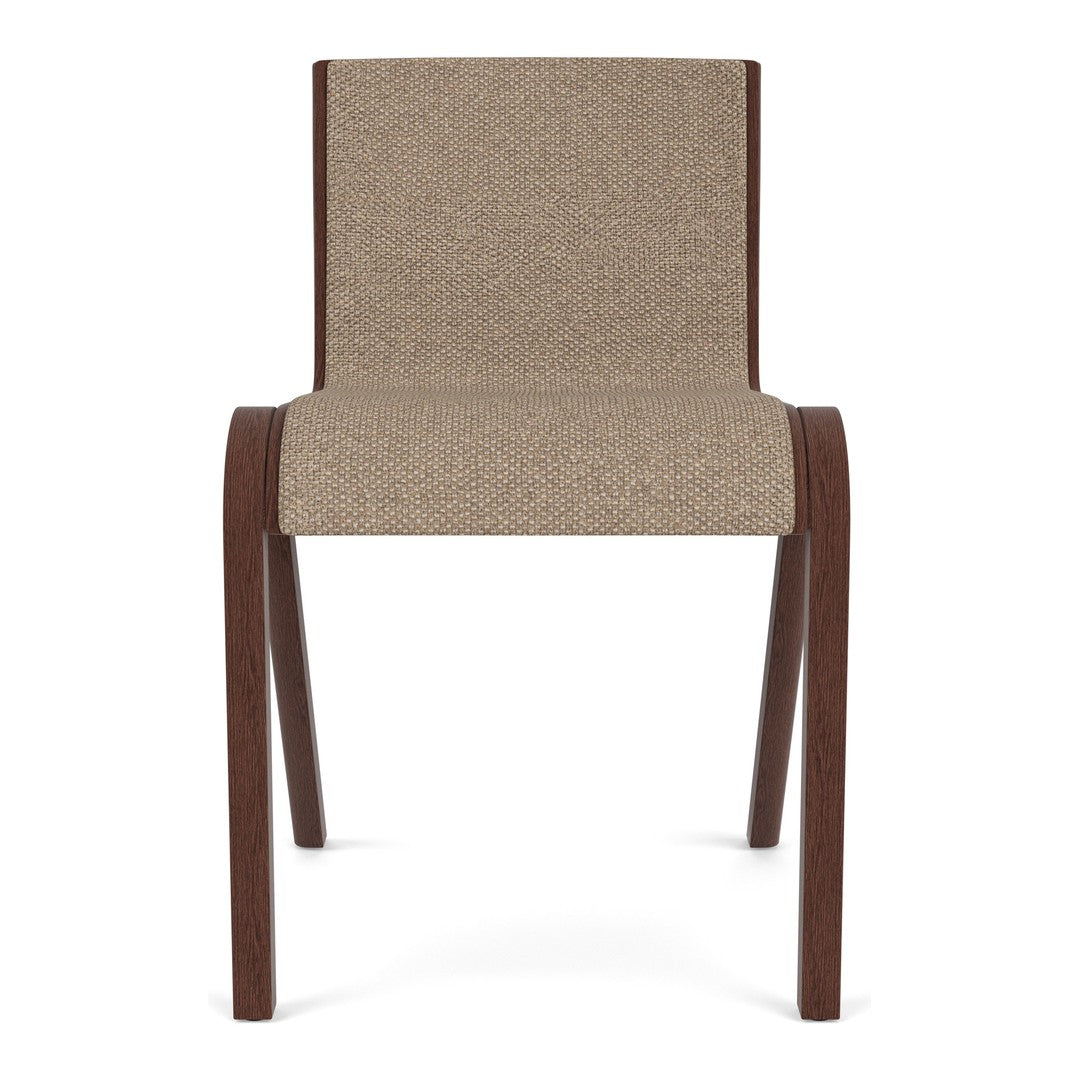 Tan upholstered chair with a textured fabric seat and dark wooden legs, featuring a minimalist design.