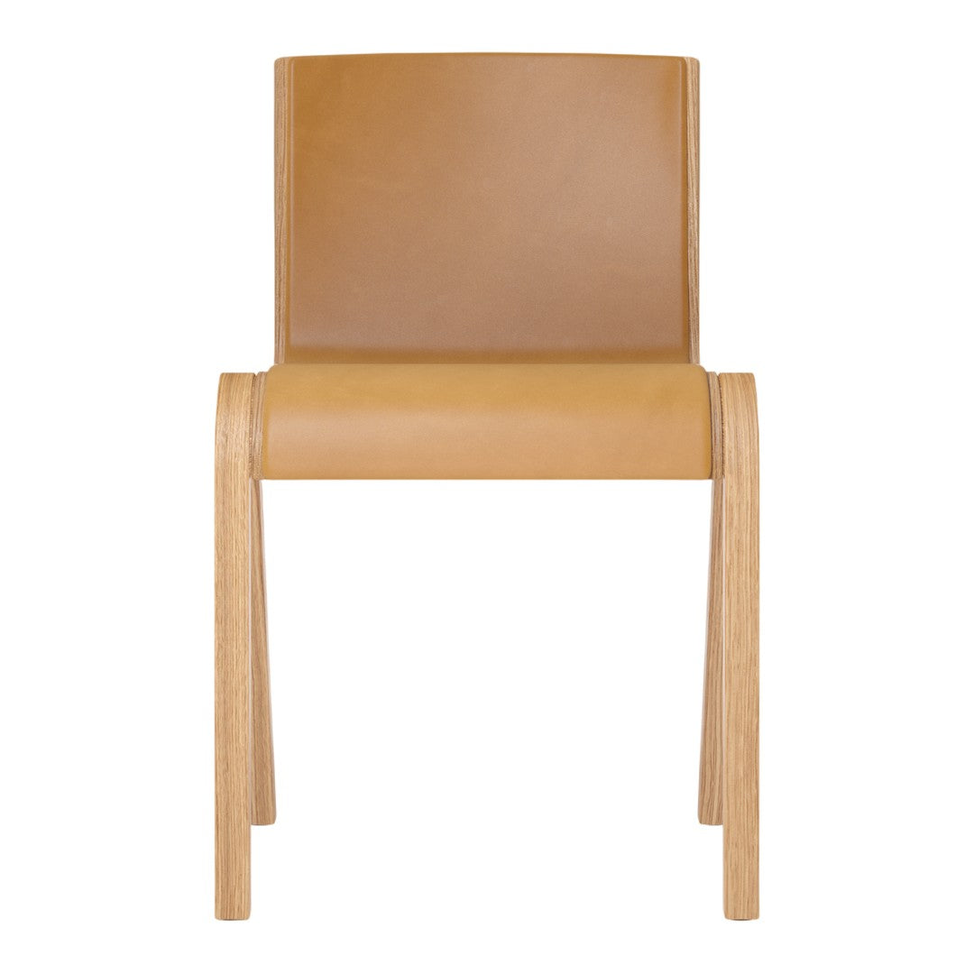 Tan leather chair with light wood legs, featuring a smooth, minimalist design and clean lines.