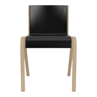Black and natural wood dining chair with a sleek, modern design and minimalistic pattern. Perfect for contemporary spaces.