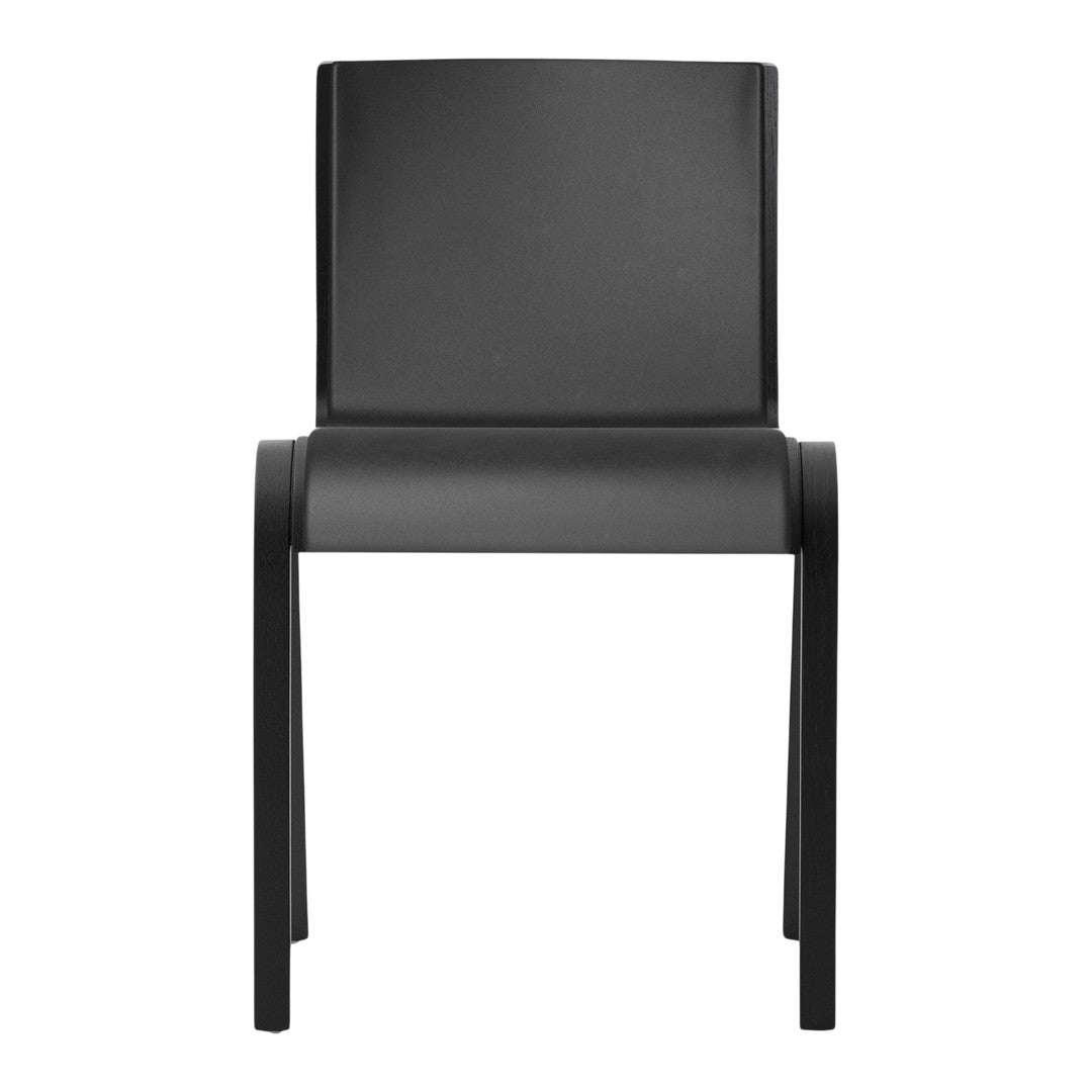Sleek black chair with a minimalist design and smooth matte finish, perfect for modern interiors.