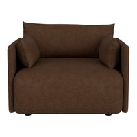 Brown upholstered armchair with soft cushions and a modern, minimalistic design, perfect for cozy spaces.