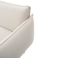 Beige fabric sofa with clean lines and a textured finish, perfect for contemporary decor.