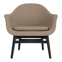 Brown textured fabric armchair with a smooth, rounded design and a sleek black wooden base. Perfect for modern decor.