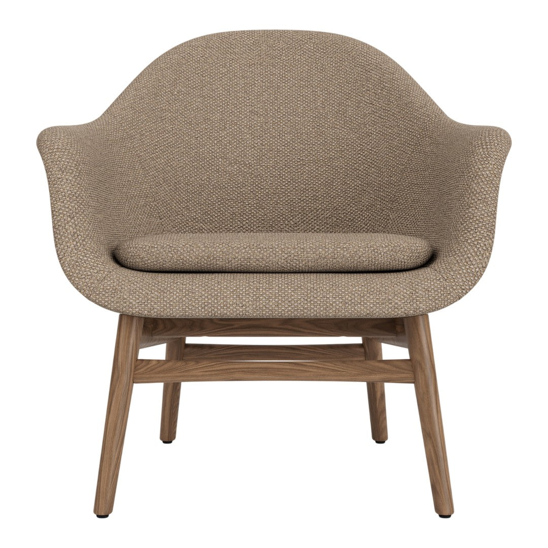 Beige upholstered chair with a smooth texture and natural wood legs, perfect for modern interior decor.