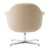 Beige textured upholstery armchair with a sleek chrome base, perfect for modern interiors.