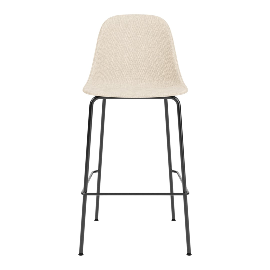 Beige bar stool with a smooth, curved seat and minimalist black metal legs. Ideal for modern interiors.