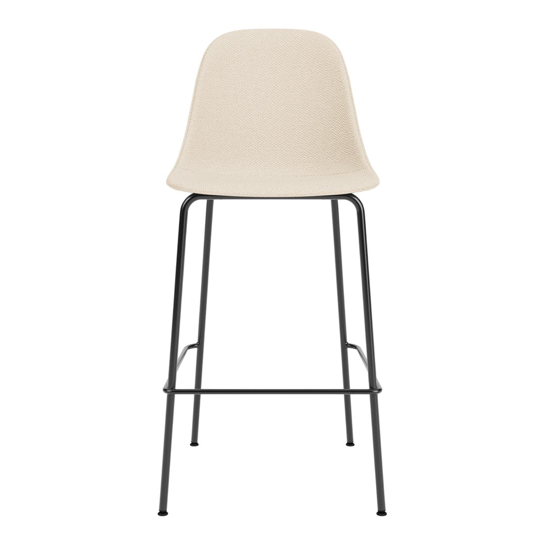 Beige bar stool with a sleek design and a black metal frame, perfect for modern decor.