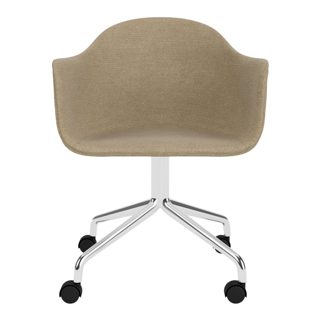Beige upholstered chair with a smooth finish and chrome base, featuring a minimalist design and sleek wheels.