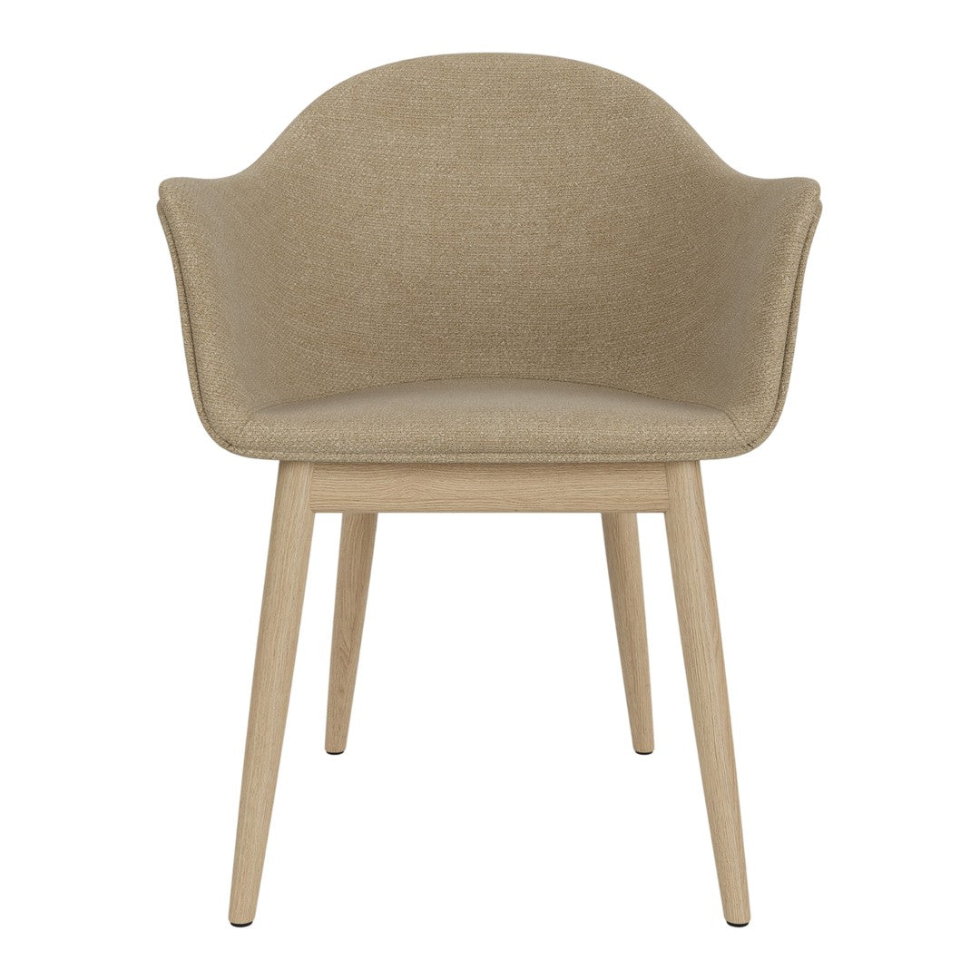 Beige upholstered chair with smooth curves and light wooden legs, featuring a minimalist design for modern interiors.