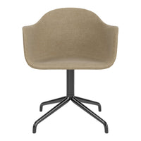Beige fabric chair with a sleek black base, featuring a minimalist design and smooth, curved lines.
