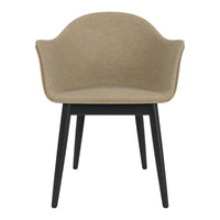Beige fabric chair with a smooth surface and black wooden legs, offering a modern and minimalist design.
