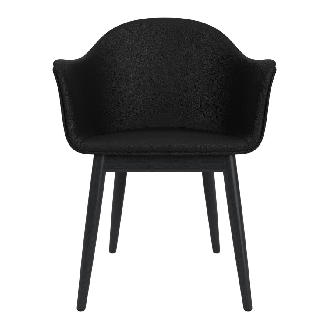 Black ergonomic chair with sleek, modern design and matching black legs. Perfect for contemporary decor.