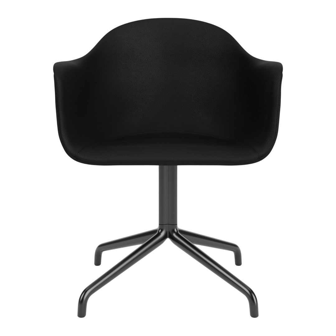 "Modern black upholstered chair with a sleek, curved design and a minimalist metal base."