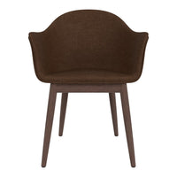 Brown upholstered chair with a smooth, curved design and wooden legs, perfect for modern interiors.