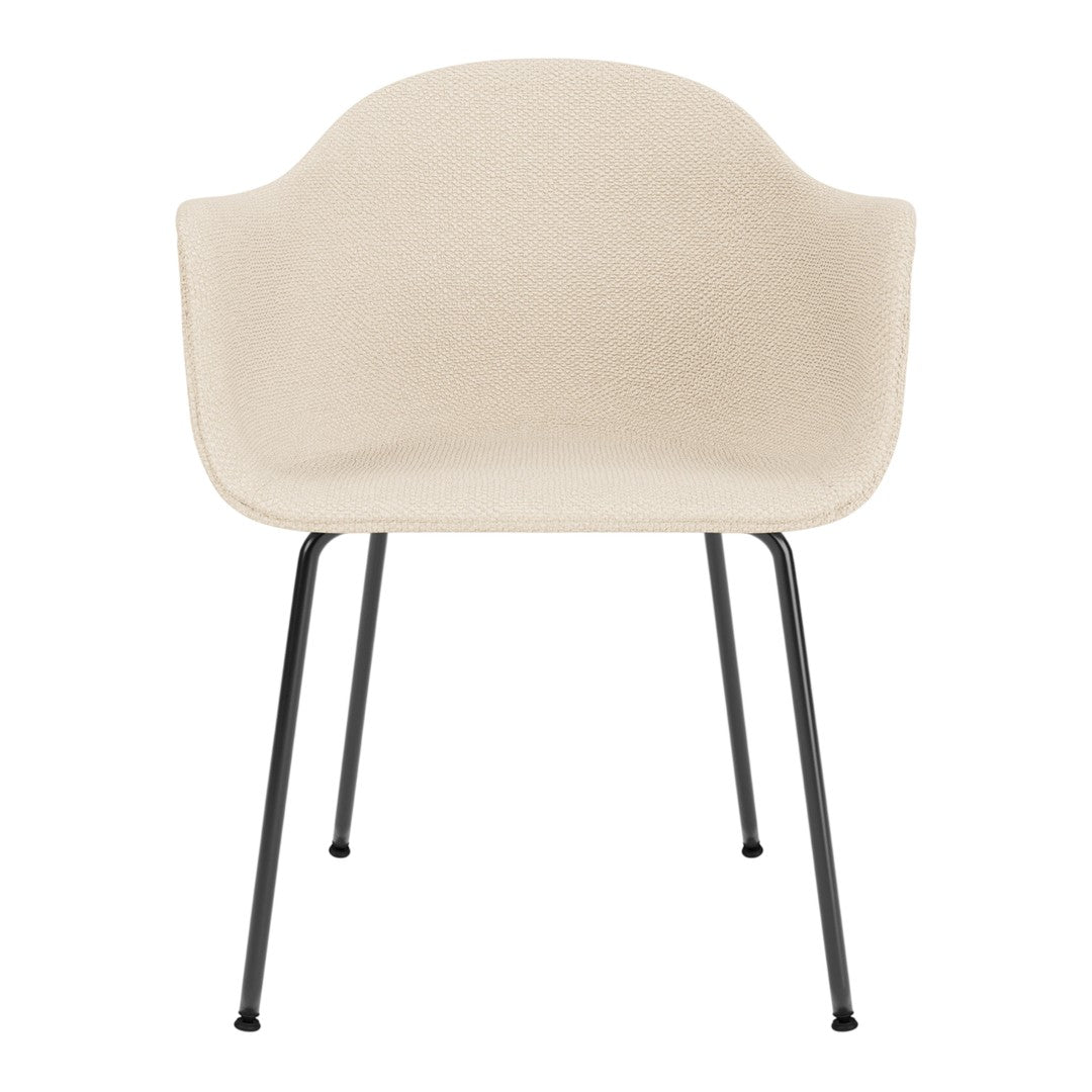 Beige upholstered chair with a minimalist design and black metal legs, perfect for modern interiors.