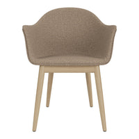 Tan upholstered chair with a textured finish and natural wood legs for a modern, minimalist look.