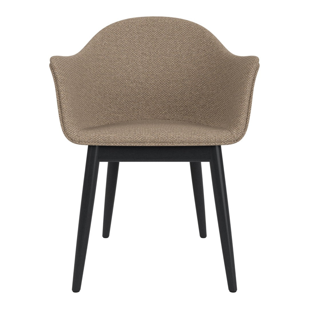Beige upholstered chair with textured fabric and sleek black wooden legs. Perfect blend of modern style and comfort.