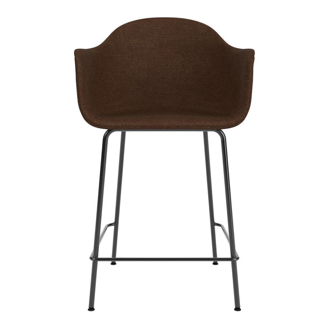 Brown upholstered bar stool with a textured fabric and sleek black metal legs. Modern and chic design.