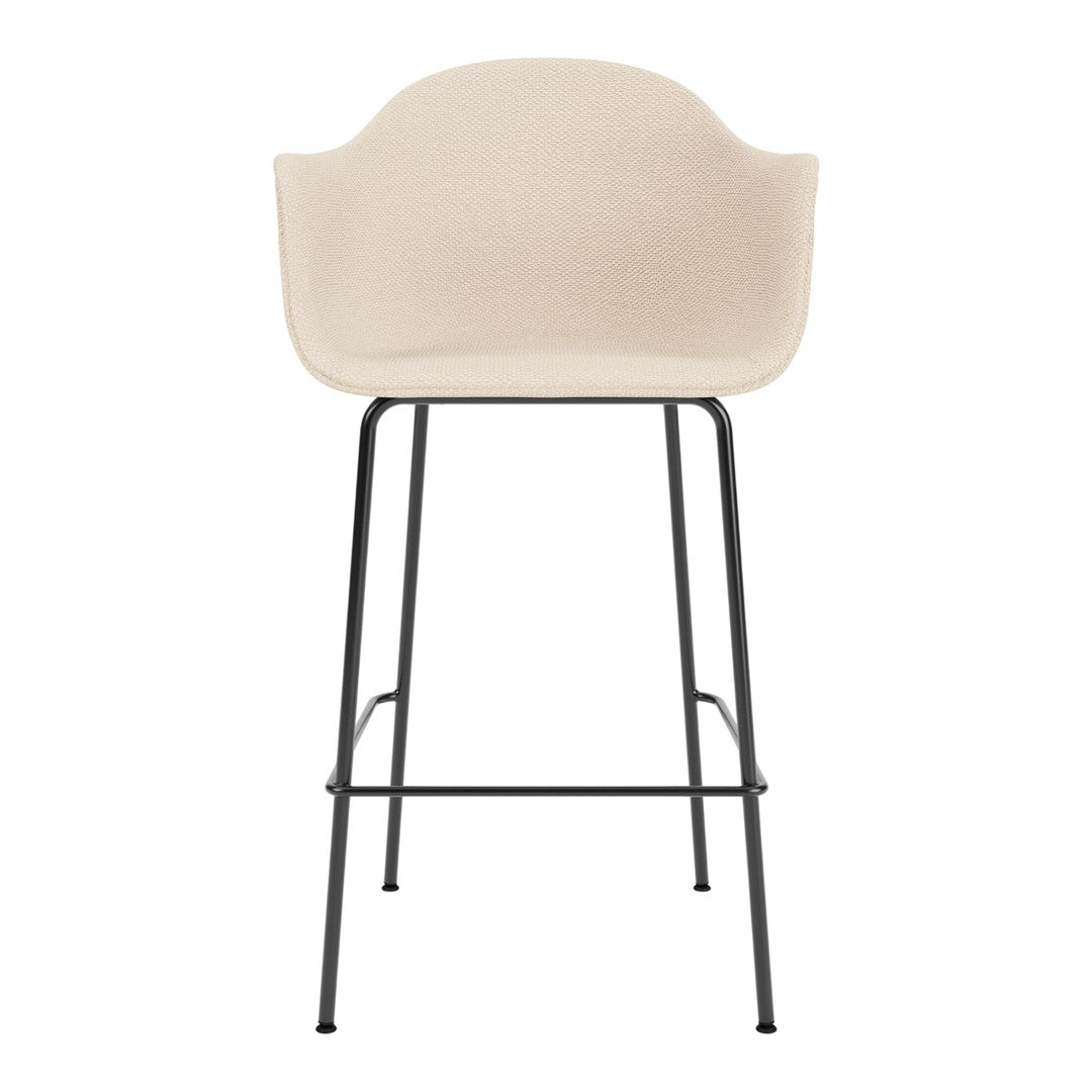 Beige textured seat with sleek black metal legs, perfect for modern decor. Ideal for kitchens or bar areas.