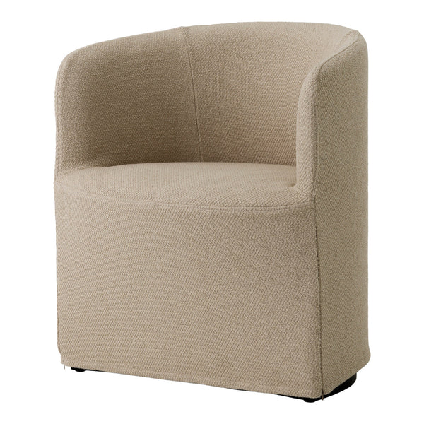 Beige upholstered accent chair with subtle textured pattern and rounded back, ideal for modern interiors.